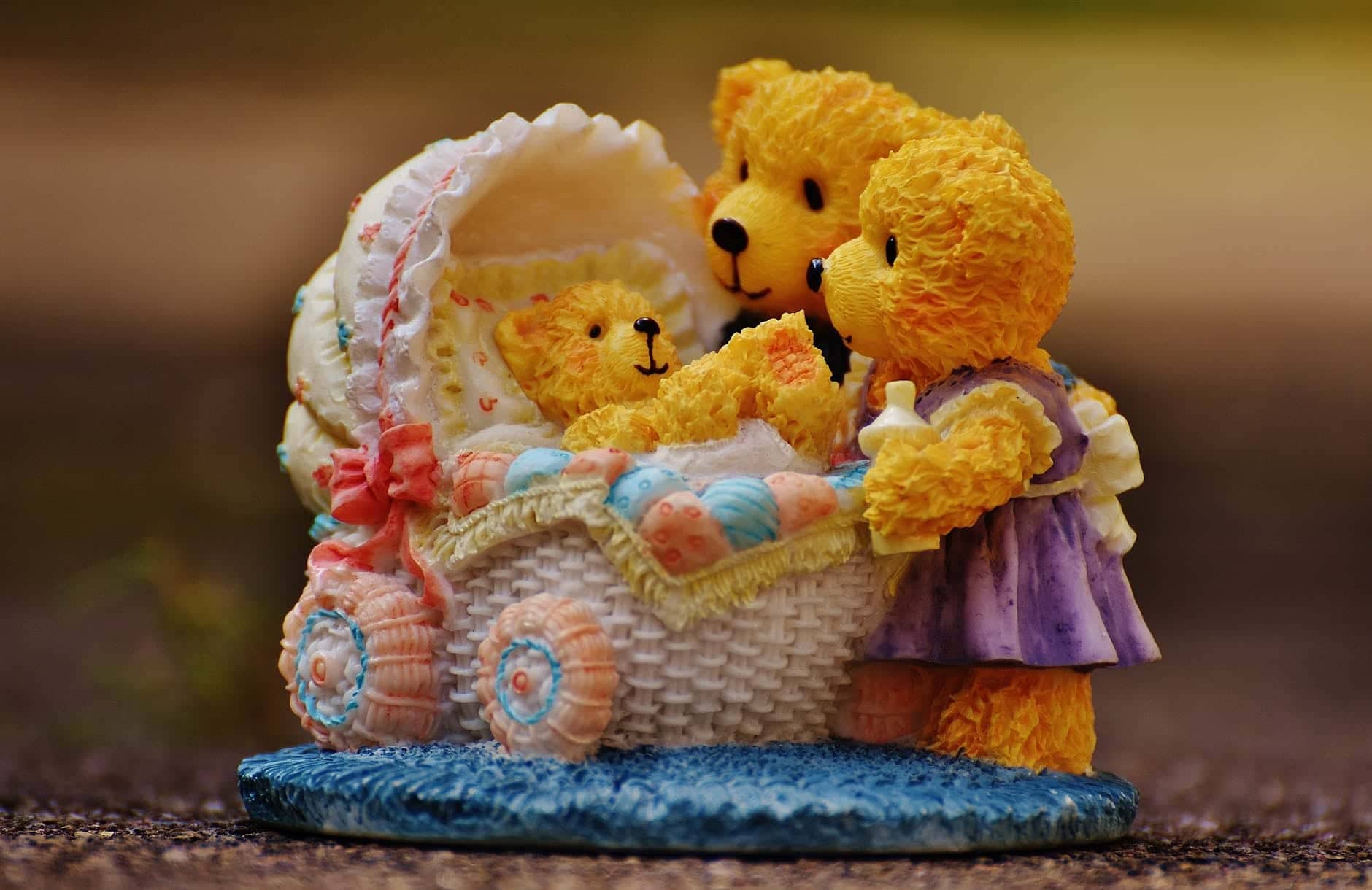 teddy bears watching over baby teddy bear figurine