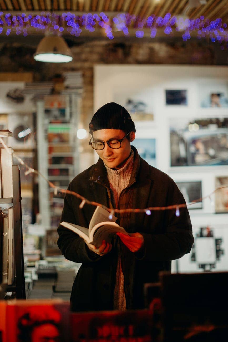 man reading book